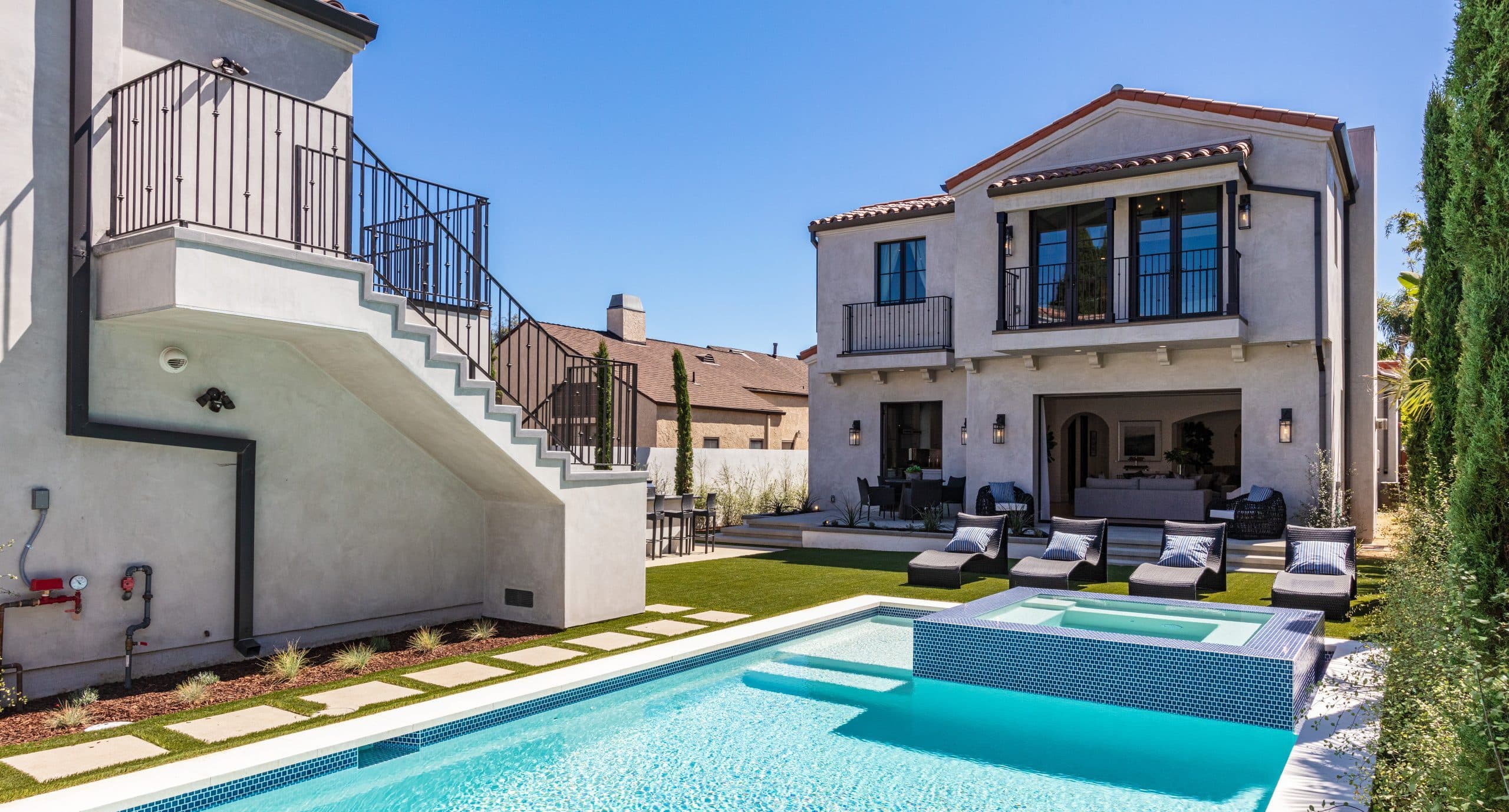 Luxury backyard with pool designed and built by BuildStrong